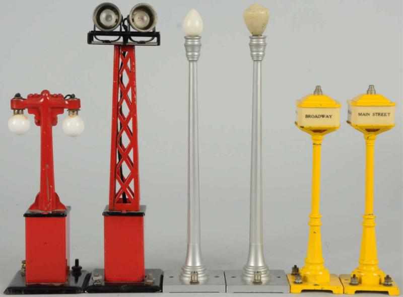 Appraisal: Lot of Lionel Marx Signals Lamp Posts American Includes two