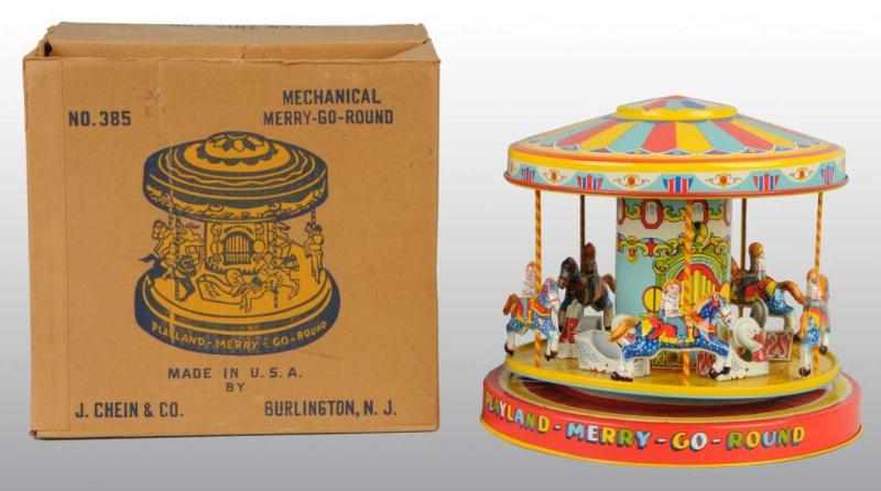 Appraisal: Tin Chein Merry-Go-Round Wind-Up Toy Description American Working Swan chariot