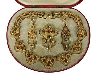 Appraisal: A parure the necklace set seven trefoils of citrines in