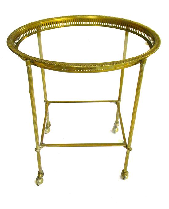 Appraisal: Small brass rolling cart fluted legs removable pierced brass serving