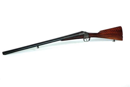 Appraisal: UNUSUAL DOUBLE BARREL SHOTGUN European th century The finely engraved