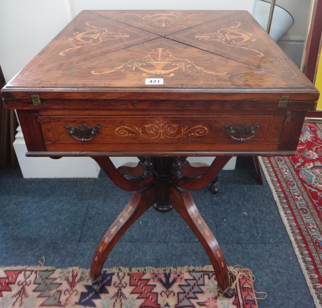 Appraisal: A late Victorian rosewood floral marquetry envelope top card table