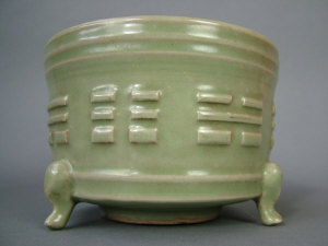 Appraisal: Chinese celadon ground censer moulded with a single band of