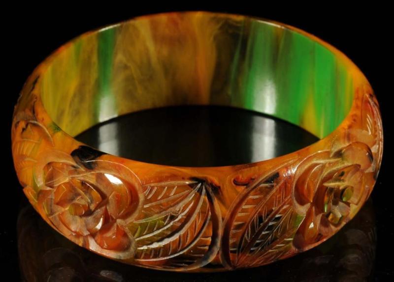 Appraisal: Bakelite Carved End of Day Bracelet Description Multi-colored and deeply