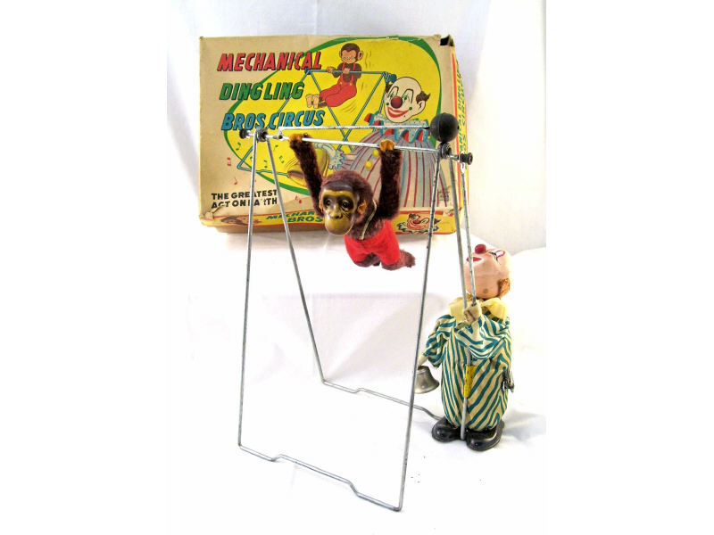 Appraisal: Alps Mechanical Dingling Bros Circus Wonderful acrobatic monkey with a