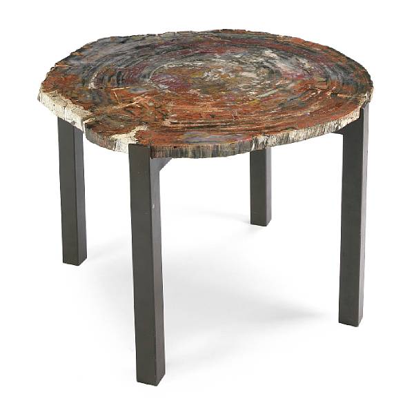 Appraisal: A Tony Duquette Studios petrified wood resin and wrought-metal table