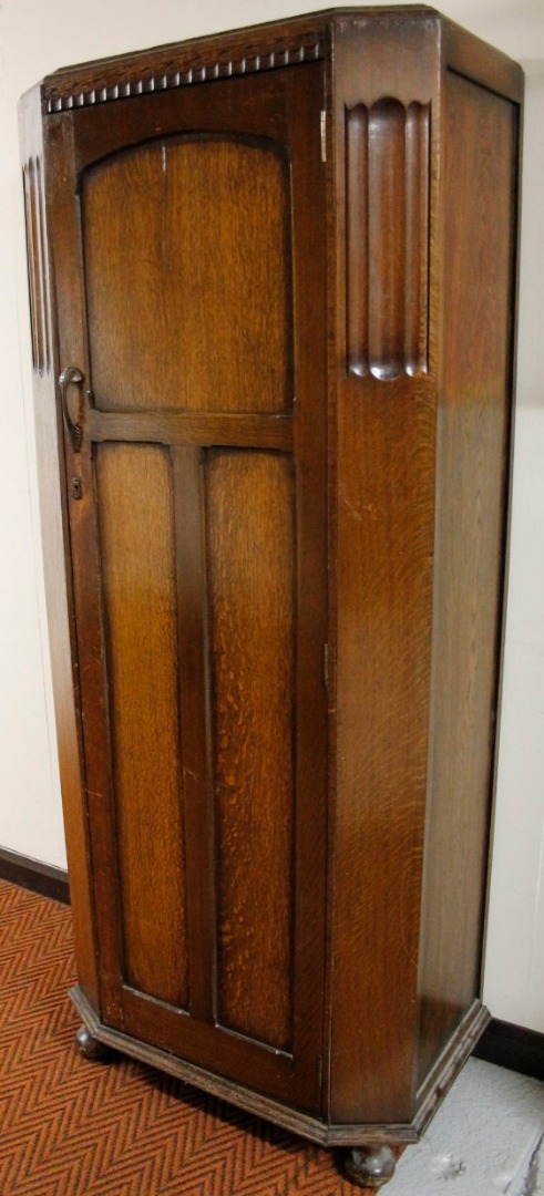 Appraisal: An early thC oak hall wardrobe with canted front and