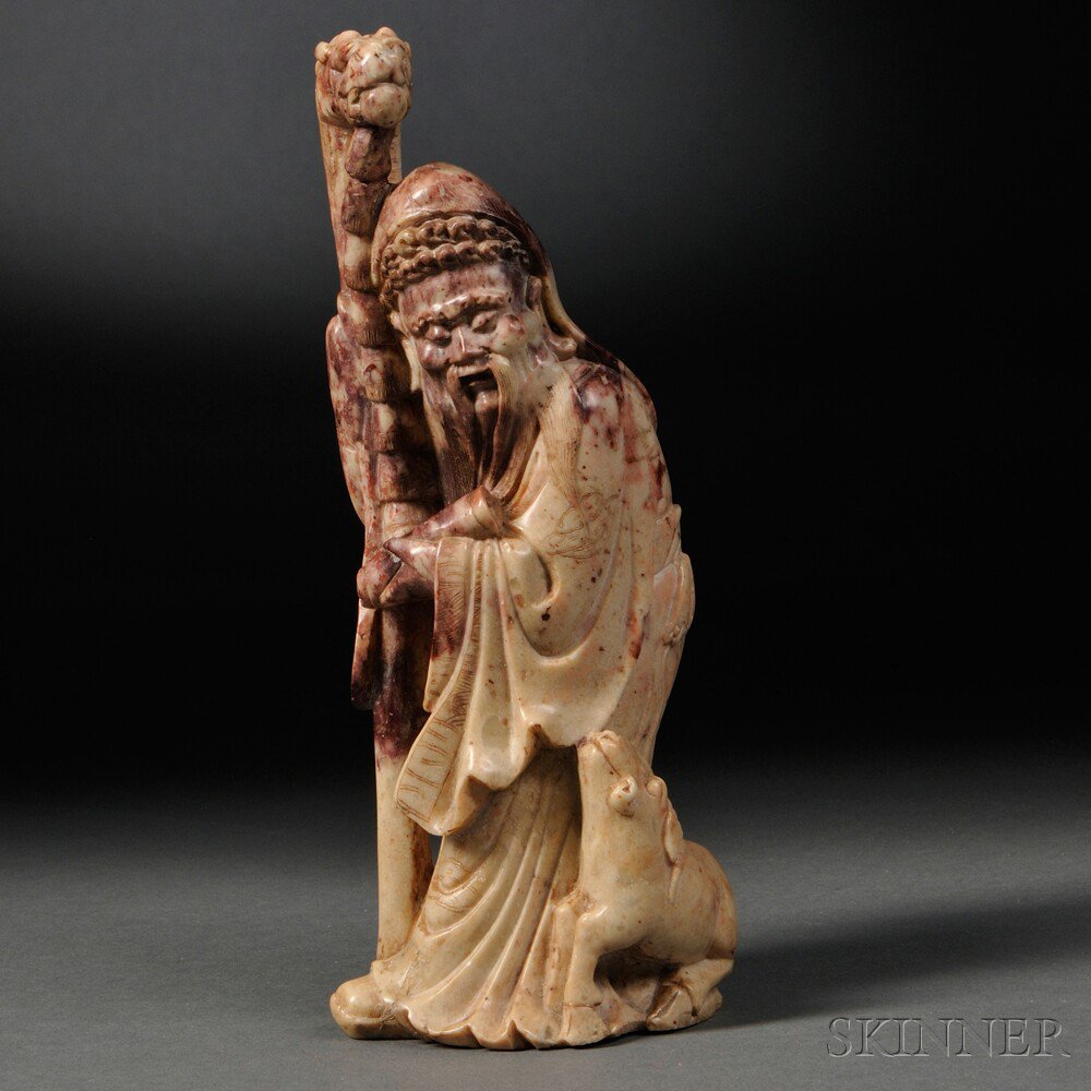 Appraisal: Figure of Shoulao China carved hardstone the beige stone flecked