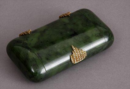 Appraisal: SPINACH GREEN JADE CIGARETTE BOX WITH FACETED GLASS AND GILT-METAL