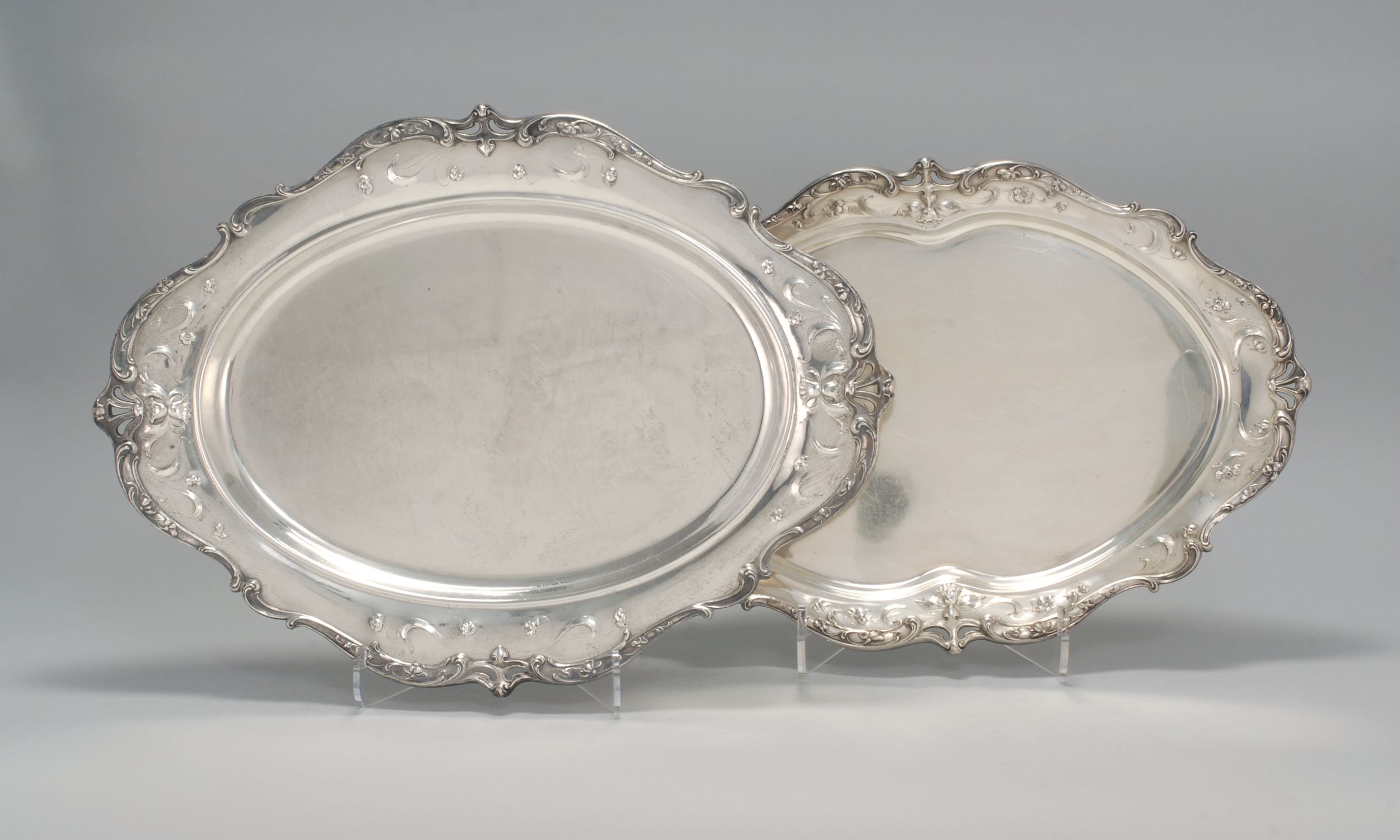 Appraisal: TWO ORNATE STERLING SILVER PLATTERS BY GORHAM MFG CO In