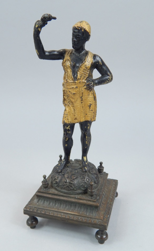 Appraisal: A gilt metal figure modelled in the form of a