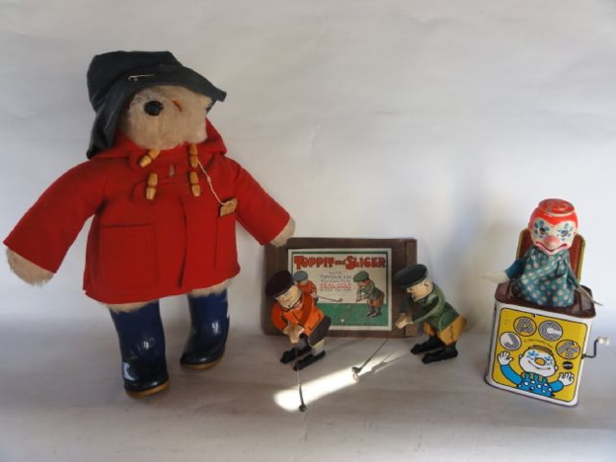 Appraisal: An assortment of vintage toys to include a Paddington Bear