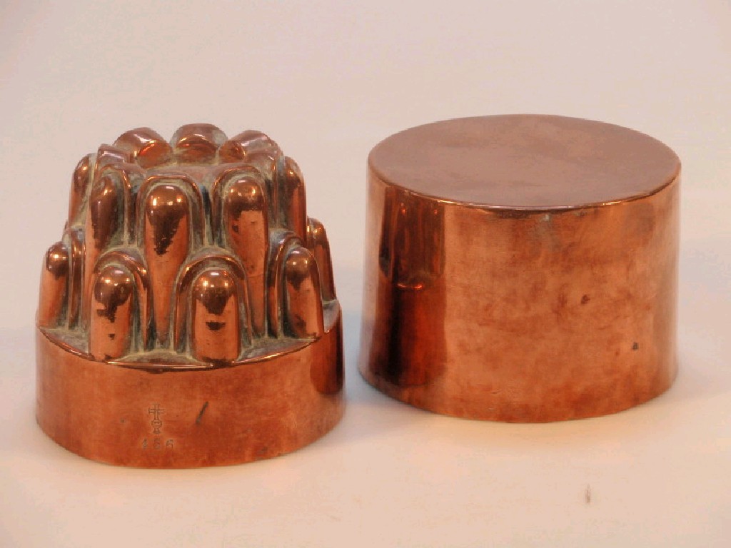 Appraisal: A thC copper castle top jelly mould and a plain