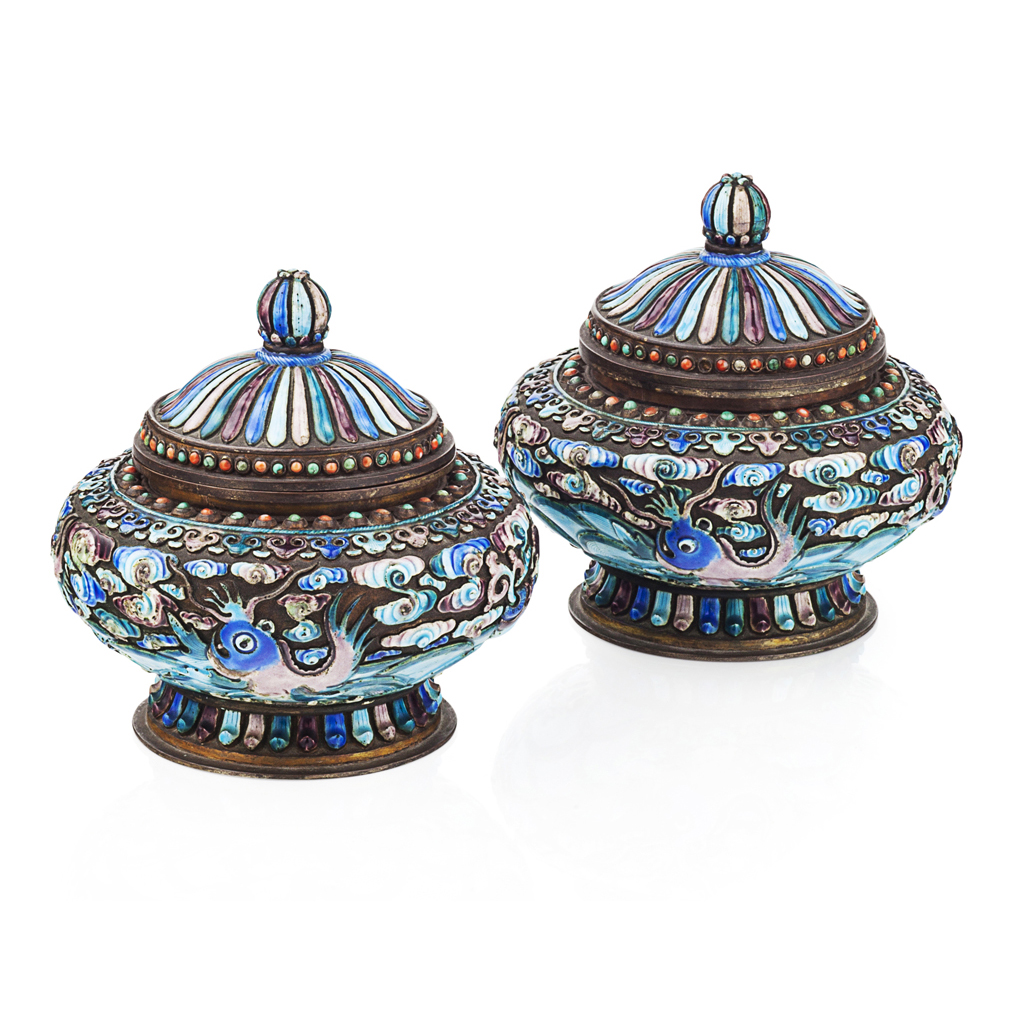 Appraisal: YPAIR OF TIBETAN-STYLE ENAMELLED METAL VASES AND COVERS of flattened