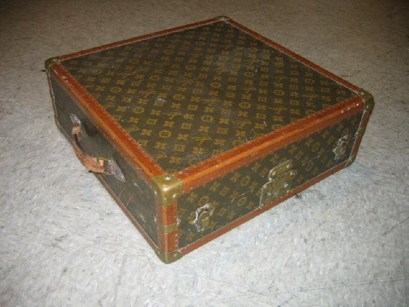 Appraisal: LOUIS VUITTON FRANCE Hard-bound LV monogram suitcase Champs Elysees label