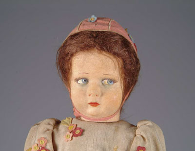 Appraisal: LENCI-TYPE CLOTH DOLL Felt doll with side-glancing eyes and brown