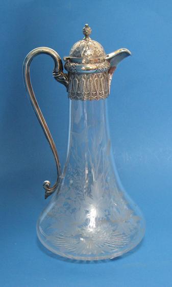 Appraisal: A VICTORIAN SILVER MOUNTED CLARET JUG of tapering cylindrical form