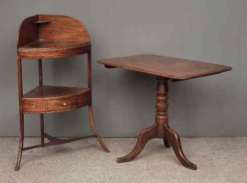 Appraisal: A George III mahogany three tier corner washstand with later