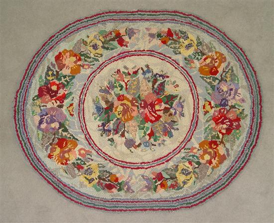 Appraisal: Brightly Colored Oval Hooked Rug Circa Attractive rug in blue