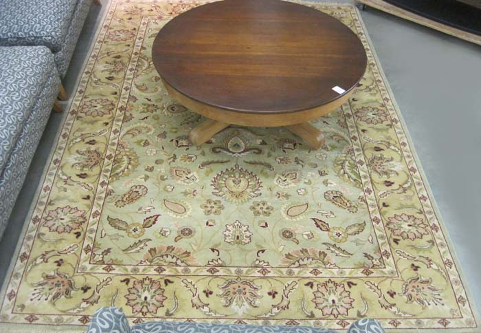 Appraisal: HAND KNOTTED ORIENTAL CARPET Indo-Persian overall floral decoration on light