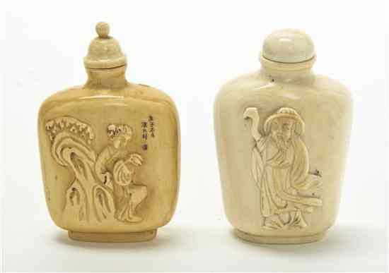 Appraisal: Two Ivory Snuff Bottles one having a relief carving of