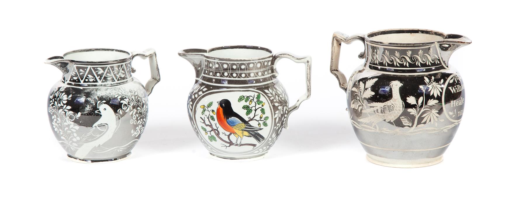 Appraisal: THREE SILVER RESIST CREAM PITCHERS England st half- th century