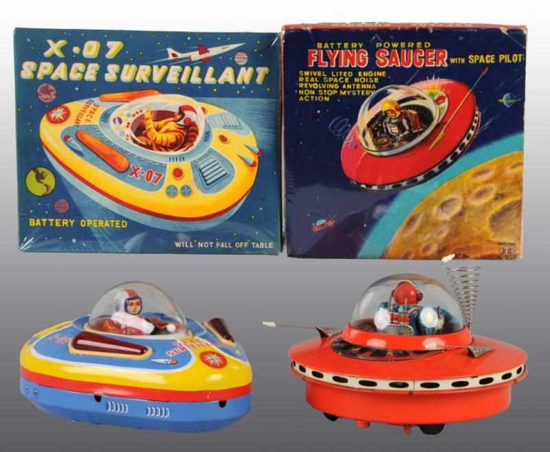 Appraisal: Lot of Tin Flying Saucer Battery-Operated Toys Description Japanese Working