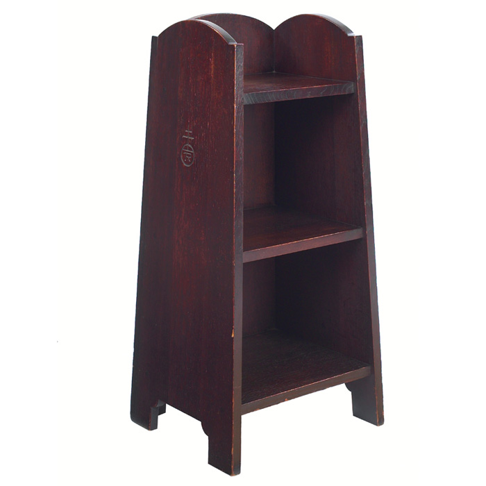 Appraisal: Roycroft magazine stand three shelf form with arched top rail