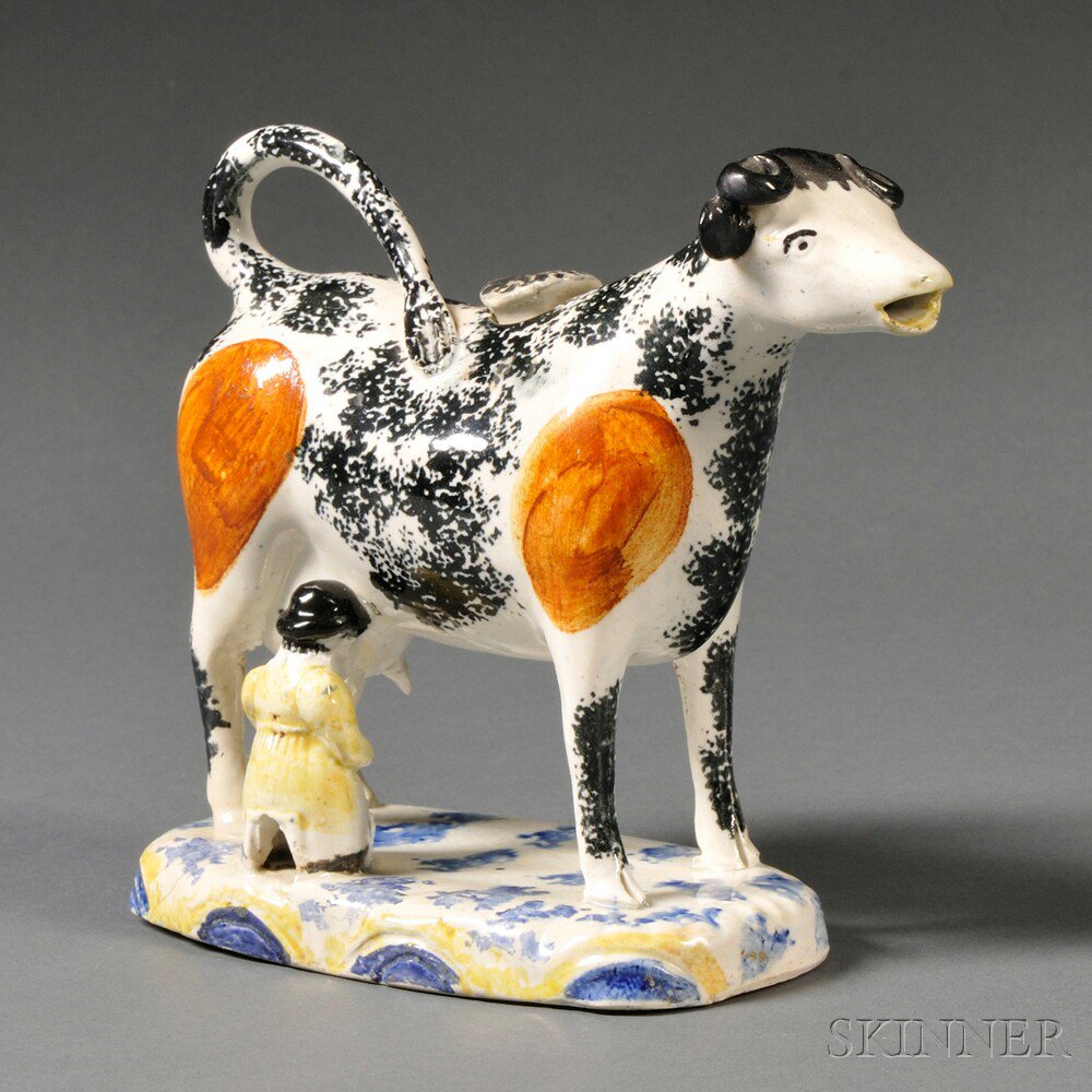 Appraisal: Staffordshire Earthenware Cow Creamer England early th century polychrome enamel