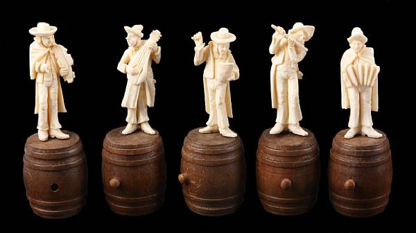 Appraisal: A group of five German carved ivory figures of musicians