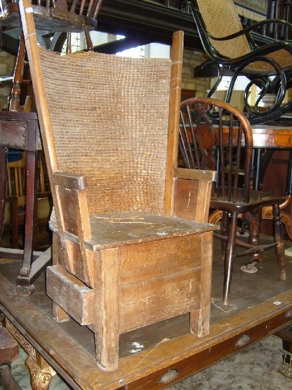 Appraisal: A th century Orkney chair in pine enclosing a side