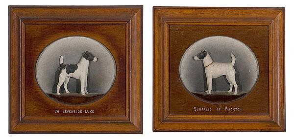 Appraisal: CARVED PLAQUES OF TERRIERS BY J HARDMAN English ca -