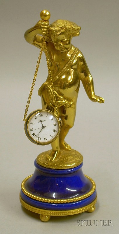 Appraisal: Italian Collecioni La Vallee Gilt and Enameled Figural Swinging Clock