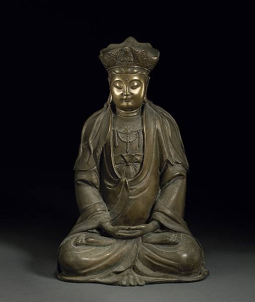 Appraisal: A cast bronze seated figure of Guanyin th th Century