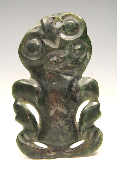 Appraisal: A MAORI JADE TIKI of stylised creature form