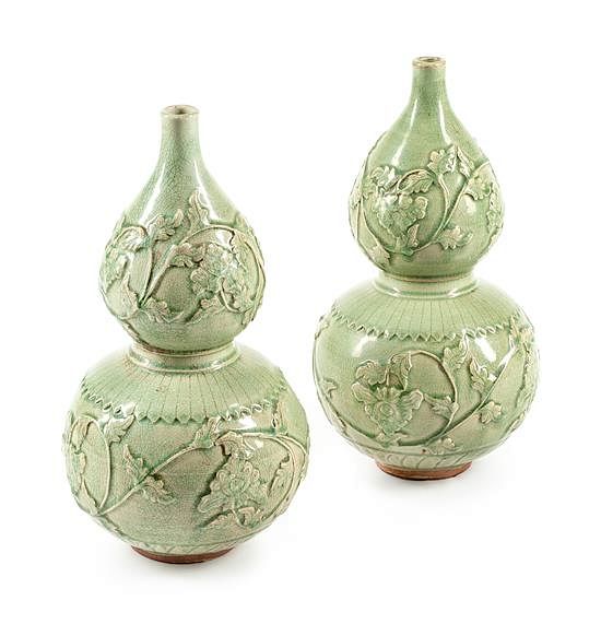 Appraisal: A Pair of Chinese Celadon Glazed Porcelain Vases Height inches