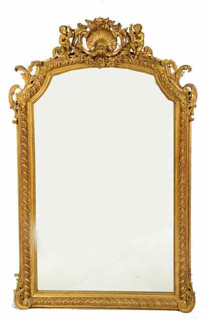 Appraisal: A REGENCY GILT PIER GLASS with beaded and gadrooned border