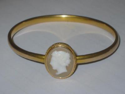 Appraisal: A VICTORIAN CAMEO BANGLE set with shell oval carved with