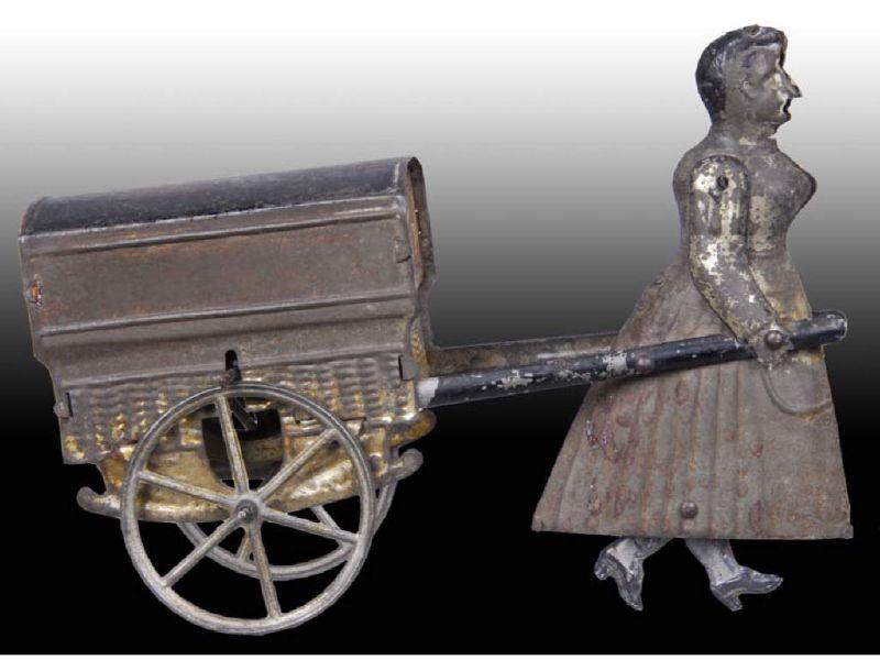 Appraisal: Early French Flywheel Woman Pulling Cart Toy Description Figure and