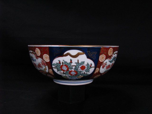 Appraisal: Gold Imari hand painted porcelain bowl decorated with oriental bird