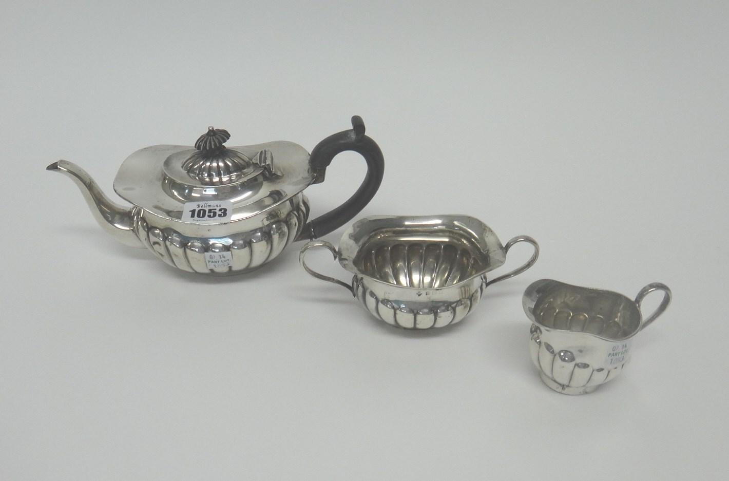 Appraisal: A silver three piece tea set comprising a teapot a