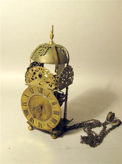 Appraisal: English brass lantern clock th century Unsigned with a bell