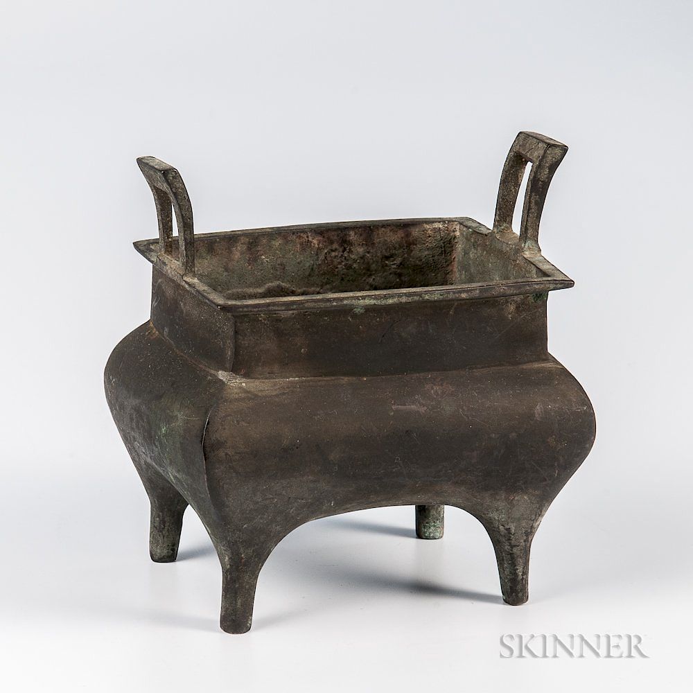 Appraisal: Quadruped Bronze Censer and a Copper Alloy Hand Warmer Quadruped