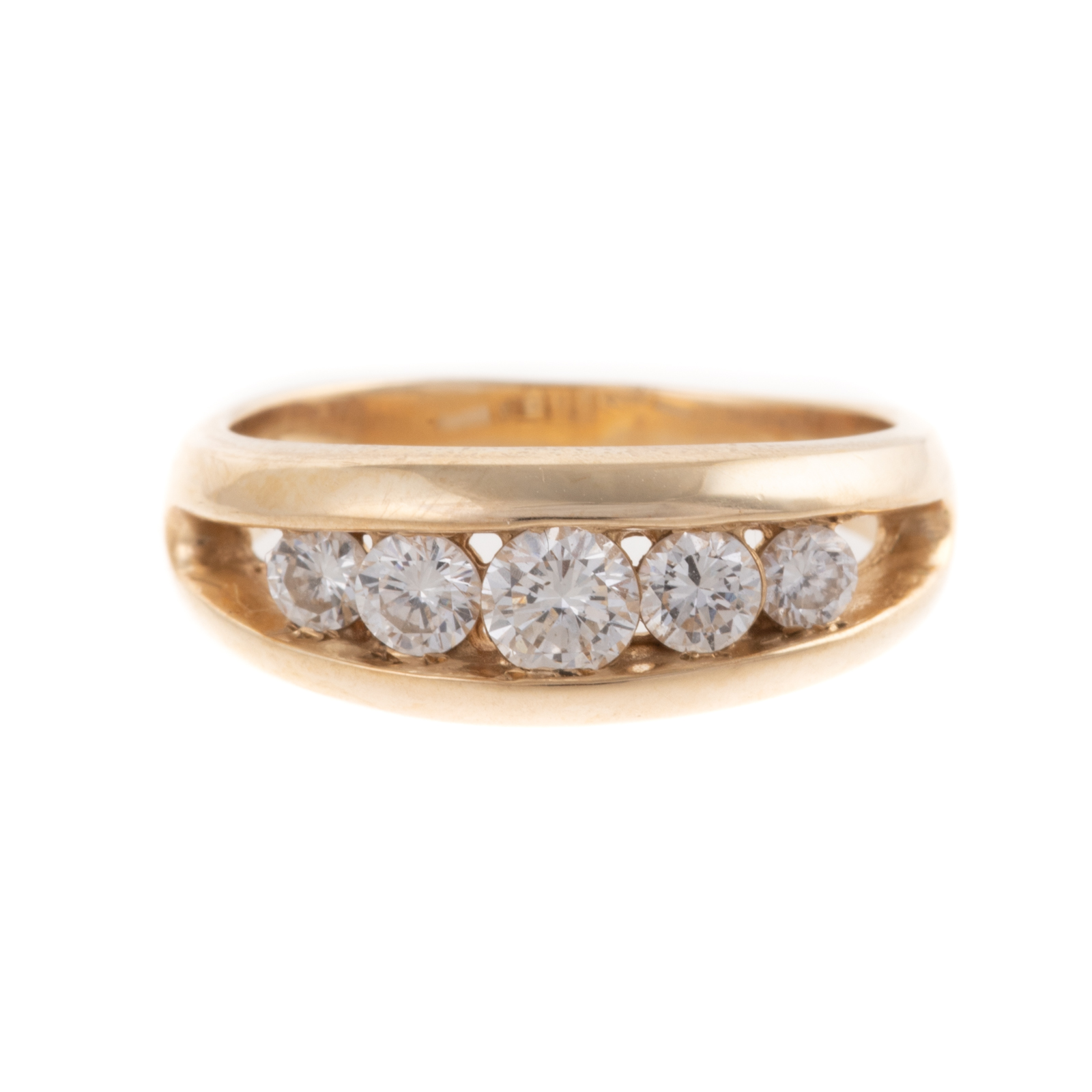 Appraisal: A CHANNEL-SET DIAMOND BAND IN K K yellow gold band