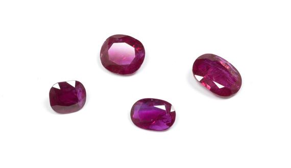 Appraisal: FOUR UNMOUNTED BURMA RUBIES oval ruby of ct oval ruby