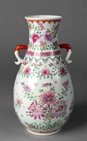 Appraisal: Chinese Famille Rose Porcelain VaseFinely enameled to depict lotus blossoms