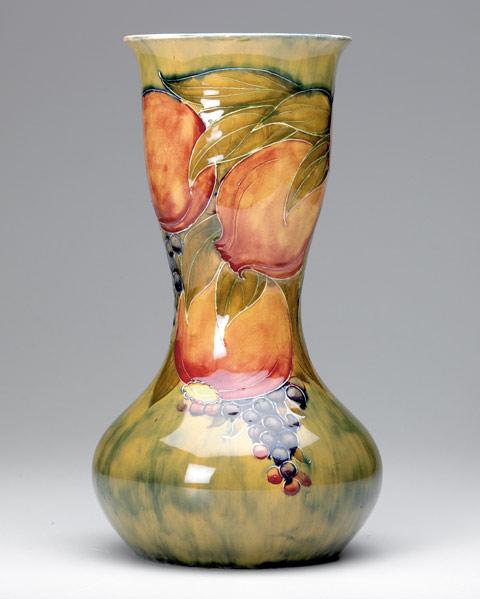 Appraisal: MOORCROFT Tall vase of unusual shape in the Pomegranate pattern