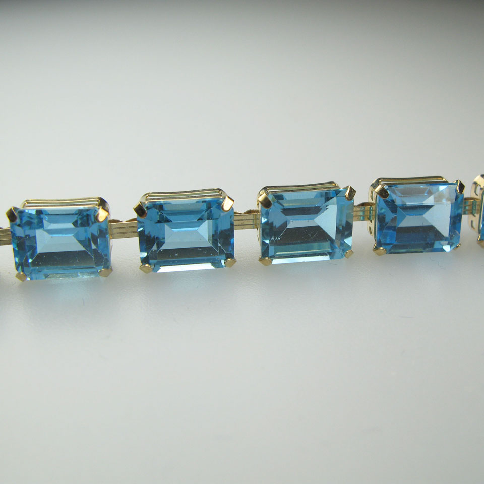 Appraisal: k Yellow Gold Bracelet set with emerald cut blue topaz