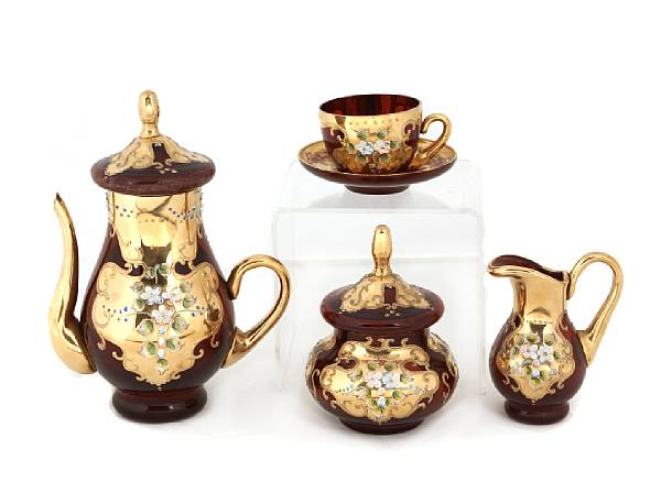 Appraisal: A Continental gilt heightened ruby glass demitasse service comprising six