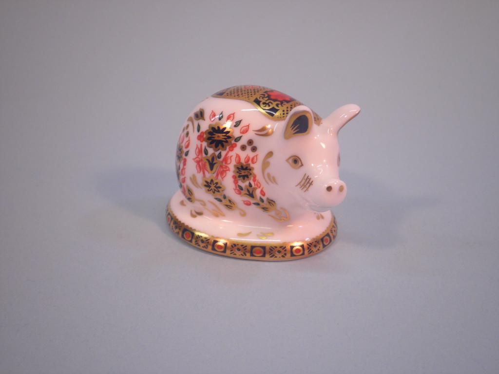 Appraisal: A Royal Crown Derby figure of a pig on a